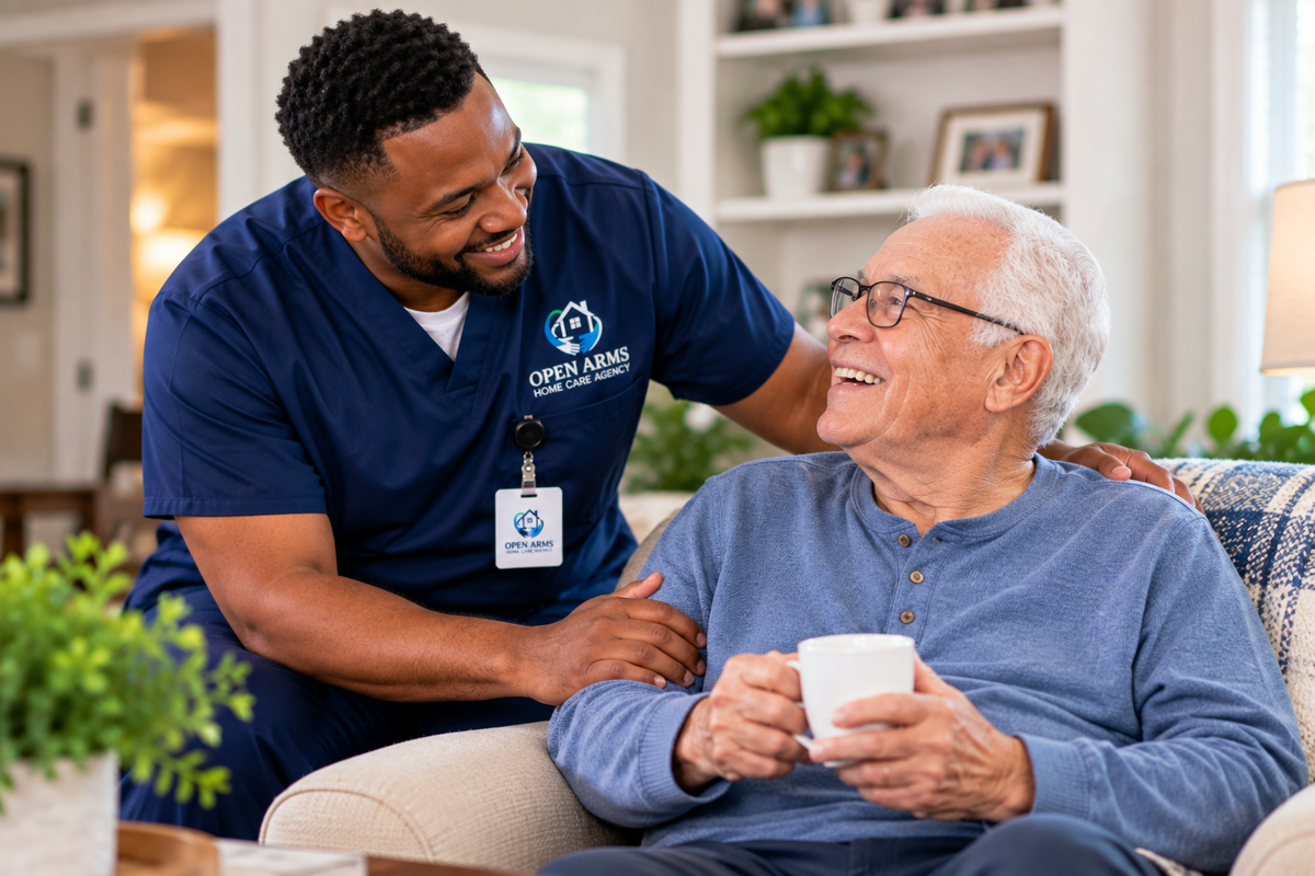 An older adult and a younger adult smiling together at a table in a home.